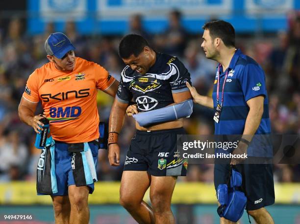 John Asiata of the Cowboys walks from the field after being injured during the round seven NRL match between the North Queensland Cowboys and the...