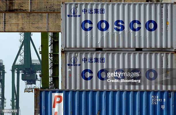 China Ocean Shipping Group Co. Shipping containers are stacked at the Port of Singapore, on Friday, Feb. 20, 2009. Cosco Corp. Singapore Ltd. Will...