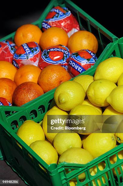 Oranges and lemons sit prior to shipment from a farm in Aprilia, south of Rome, Italy, on Friday, April 24, 2009. European Union agricultural income...