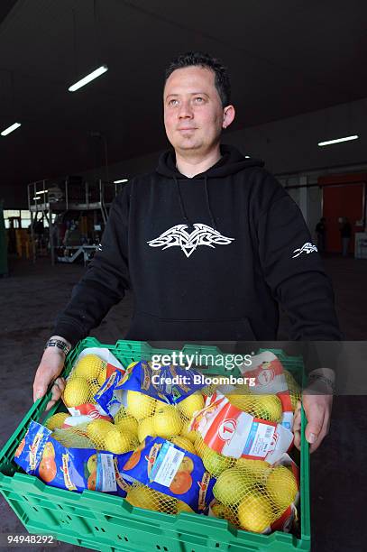 Packs of lemons are prepared for shipment at a farm in Aprilia, south of Rome, Italy, on Friday, April 24, 2009. European Union agricultural income...