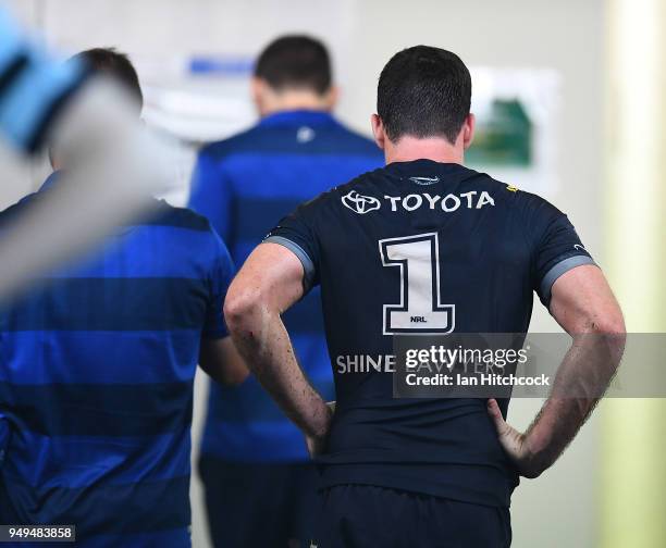 Lachlan Coote of the Cowboys walks from the field after being injured during the round seven NRL match between the North Queensland Cowboys and the...