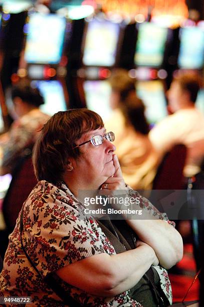 Kathy O'Donnell plays a slot machines at the Sands Casino Resort Bethlehem in Bethlehem, Pennsylvania, U.S., on Friday, May 22, 2009. The casino,...