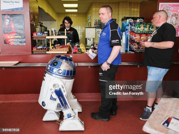 An R2 unit from Star Wars waits in line at a cafe during the Scarborough Sci-Fi event held at the seafront Spa Complex on April 21, 2018 in...