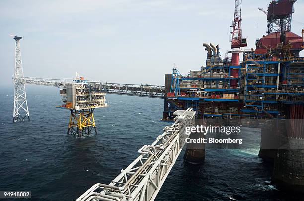 The StatoilHydro Sleipner A gas platform, right, sits with the Sleipner R platform, center, in the North Sea of the coast of Norway, on Friday, April...