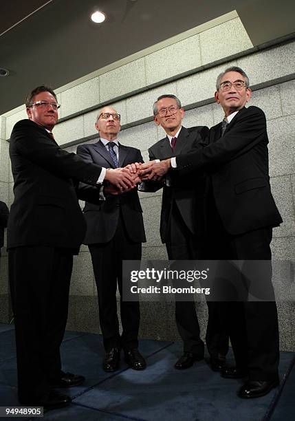 Jonathan Kindred, president of Morgan Stanley Japan Securities, left, Walid Chammah, co-president of Morgan Stanley, second from left, and Nobuo...