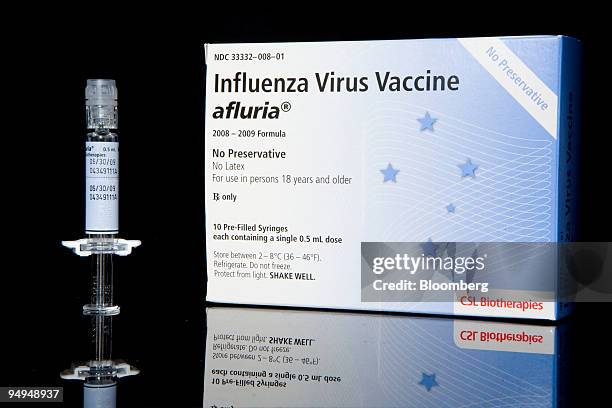 Biotherapies Afluria influenza virus vaccine is arranged for a photo at New London Pharmacy in New York, U.S., on Tuesday, April 28, 2009. It's up to...