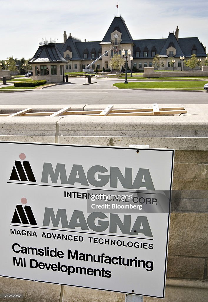 Magna A sign stands outside the headquarters of Magna International Inc ...