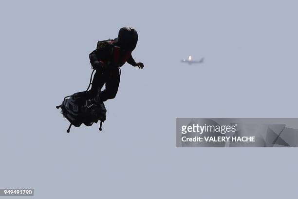 French pilot Franky Zapata flies his Flyboard jetpack during the 2018 Red Bull Air Race World Championship on April 21, 2018 in Cannes.
