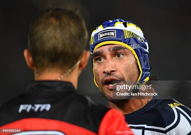 Johnathan Thurston of the Cowboys speaks to the referee during the round seven NRL match between the North Queensland Cowboys and the Gold Coast...