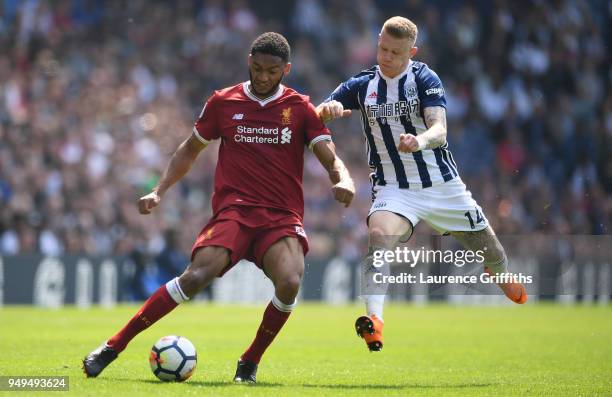 Joe Gomez of Liverpool is challenged by James McClean of West Bromwich Albion during the Premier League match between West Bromwich Albion and...