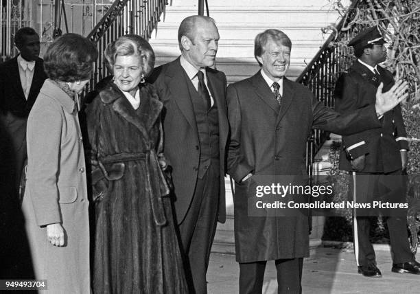 View of First Lady Betty Ford and US President Gerald Ford welcome incoming First Lady Rosalynn Carter and US President-Elect Jimmy Carter to the...