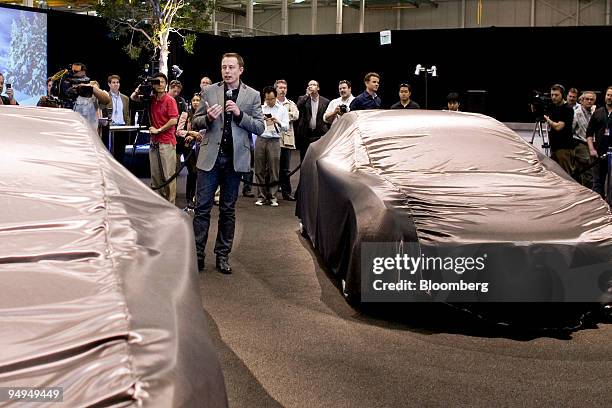 Elon Musk, chairman and chief executive officer of Tesla Motors Inc., speaks before unveiling the Tesla Model S electric car at the Space Exploration...