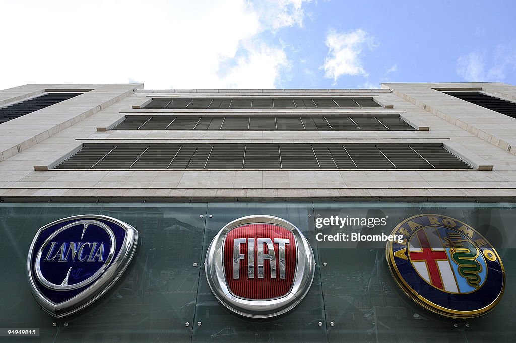 Logos are displayed on the Fiat Mirafiori motor village in T