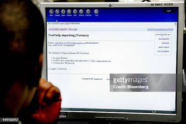 Jameson Canady who has been out of work for four months, surfs the Craigslist Web site for temporary jobs at the Employment Development Department...