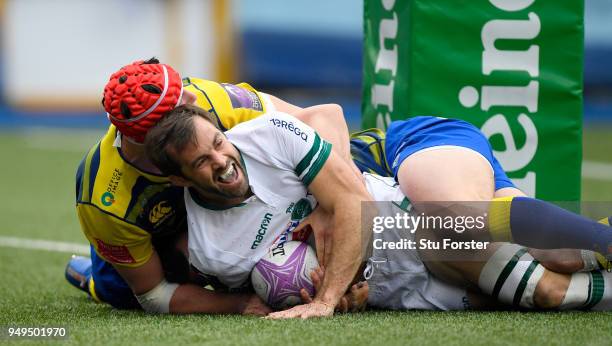 Blues forward Seb Davies can't stop Conrad Smith of Pau touching down for their first try during the European Challenge Cup Semi-Final match between...