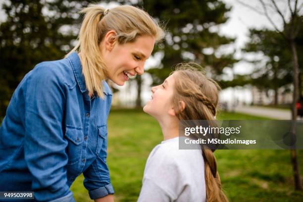 family moments. - girl hold nose stock pictures, royalty-free photos & images