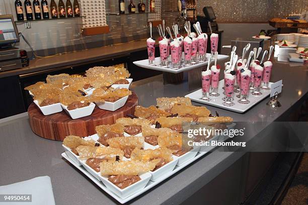 Chocolate Mousse and Berry Parfait deserts are displayed during a culinary media day at Citi Field in Flushing, New York, U.S., on March 31, 2009. If...