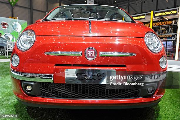 The new Fiat 500c sits on display at the Fiat stand prior to the 79th Geneva International Motor Show in Geneva, Switzerland, on Wednesday, March 4,...