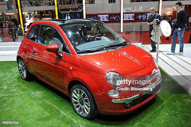 The new Fiat 500c sits on display at the Fiat stand prior to the 79th Geneva International Motor Show in Geneva, Switzerland, on Wednesday, March 4,...