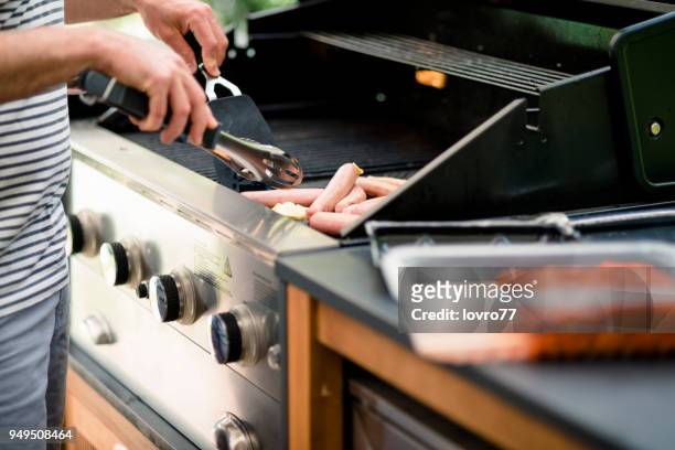 family preparing lunch - grus rubicunda stock pictures, royalty-free photos & images
