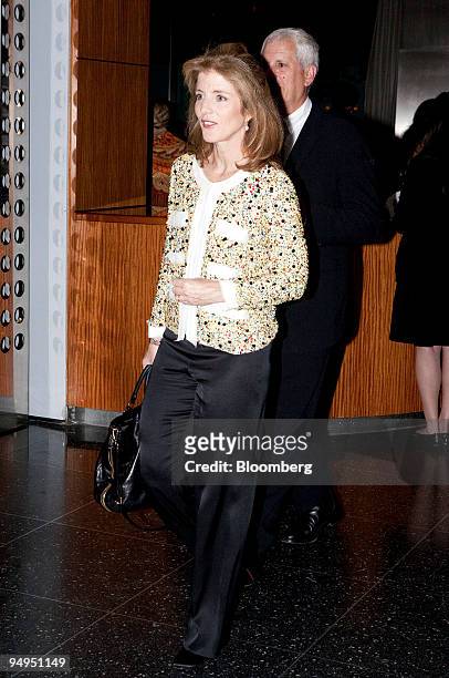 Caroline Kennedy, left, arrives with her husband Edwin Schlossberg to the Museum of Modern Art's Annual Party in the Garden in New York, U.S., on...