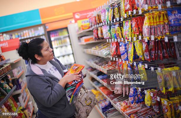Ana Meija shops for candy at a Family Dollar store in Norcross, Georgia, U.S., on Tuesday, April 7, 2009. Family Dollar is due to report earnings...