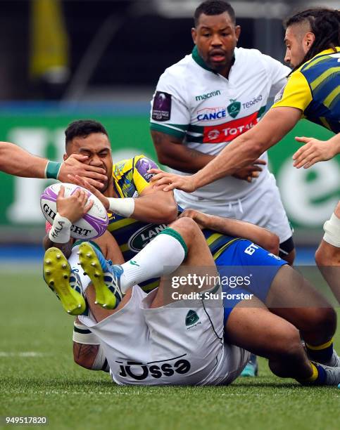 Blues centre Willis Halaholo receives a hand to the face during the European Challenge Cup Semi-Final match between Cardiff Blues and Section Paloise...