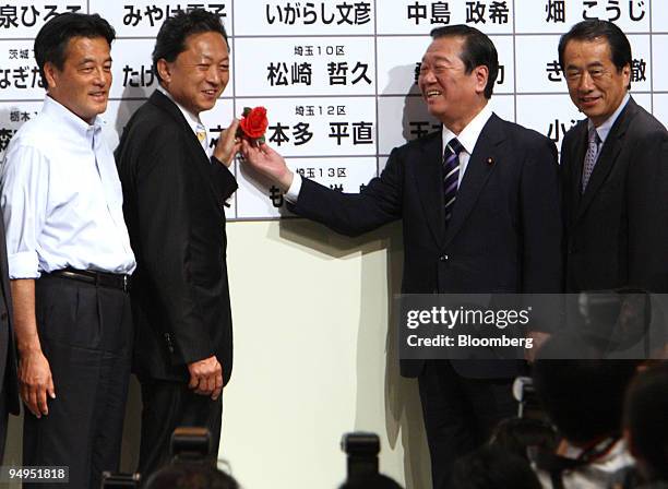 Yukio Hatoyama, president of the Democratic Party of Japan , second from left, along with party executives including Katsuya Okada, secretary...