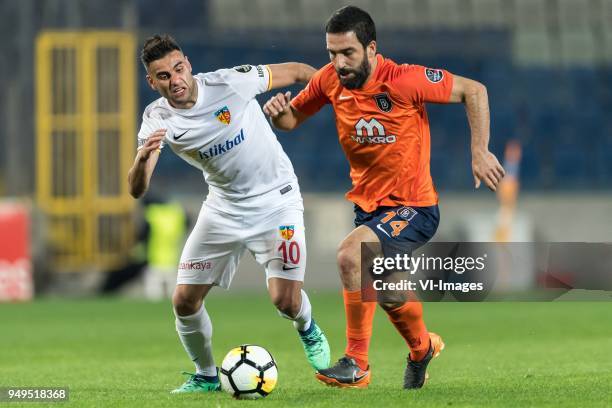 Deniz Türüç of Kayserispor, Arda Turan of Istanbul Medipol Basaksehir FK during the Turkish Spor Toto Super Lig football match between Medipol...