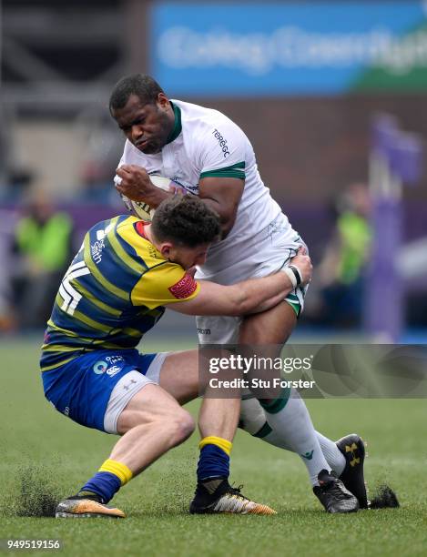 Blues wing Alex Cuthbert tackles Pau wing Watisoni Votu during the European Challenge Cup Semi-Final match between Cardiff Blues and Section Paloise...