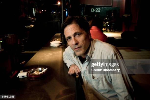 Michael Pettis, owner of the nightclub D-22, professor of finance at Peking University and former principal at Bear Stearns, poses for a portrait in...