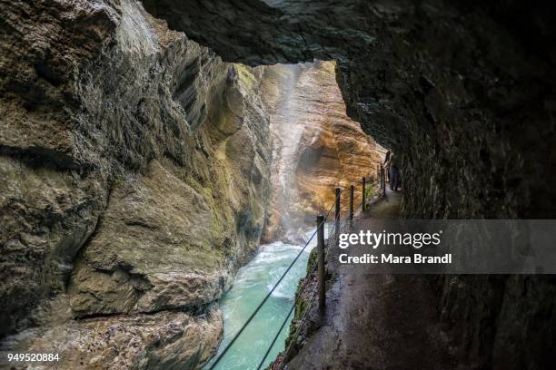 hiking trail through the partnach gorge, partnachklamm, partnach river, garmisch-partenkirchen district, werdenfelser land, wetterstein, upper bavaria, bavaria, germany - partnach gorge stock pictures, royalty-free photos & images