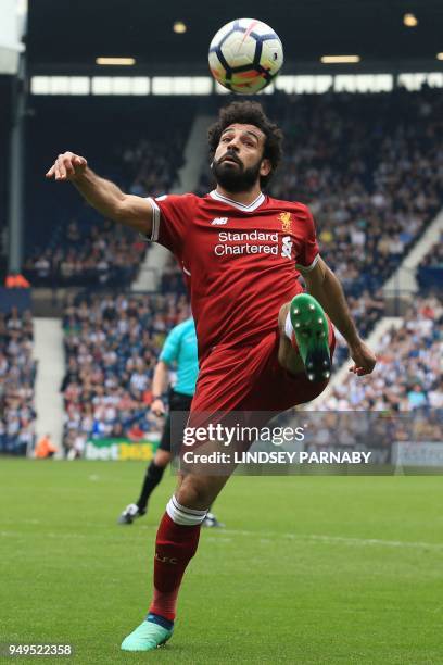 Liverpool's Egyptian midfielder Mohamed Salah controls the ball during the English Premier League football match between West Bromwich Albion and...