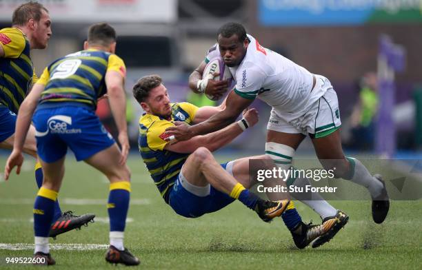 Blues wing Alex Cuthbert tackles Pau wing Watisoni Votu during the European Challenge Cup Semi-Final match between Cardiff Blues and Section Paloise...