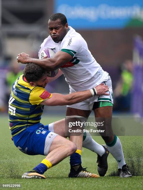 Blues wing Alex Cuthbert tackles Pau wing Watisoni Votu during the European Challenge Cup Semi-Final match between Cardiff Blues and Section Paloise...