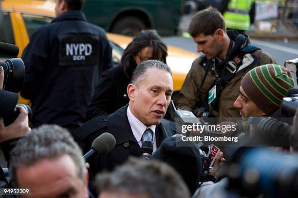 Attorney Mark Feltz, who represents victims of Bernard Madoff, founder of Bernard L. Madoff Investment Securities LLC, speaks to the media outside of...