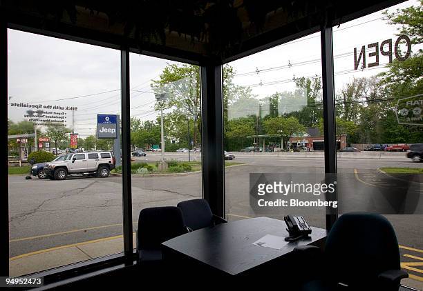 An empty desk sits inside the Jeep 17 dealership in Paramus, New Jersey, U.S., on Thursday, May 14, 2009. Chrysler LLC asked court permission to...