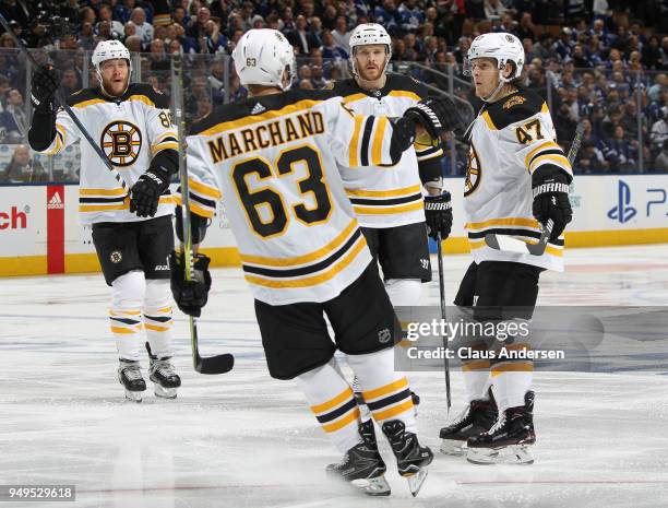 Torey Krug of the Boston Bruins celebrates his goal against the Toronto Maple Leafs in Game Four of the Eastern Conference First Round in the 2018...