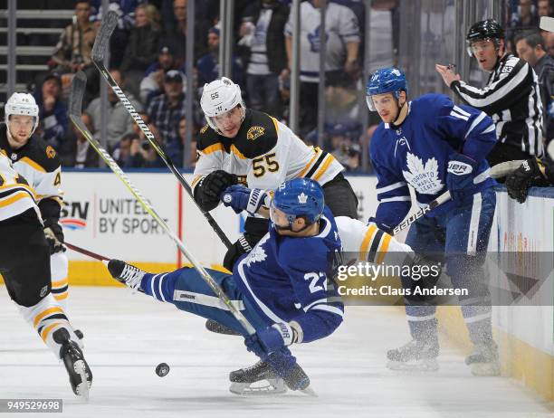 Noel Acciari of the Boston Bruins levels Nikita Zaitsev of the Toronto Maple Leafs in Game Four of the Eastern Conference First Round in the 2018...