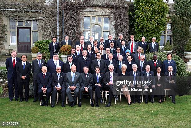 Finance ministers and central bank governors pose for the family photograph, front row left to right, Guido Mantega, Brazil's finance minister,...