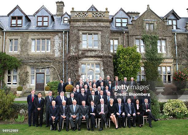 Finance ministers and central bank governors pose for the family photograph, front row left to right, Guido Mantega, Brazil's finance minister,...