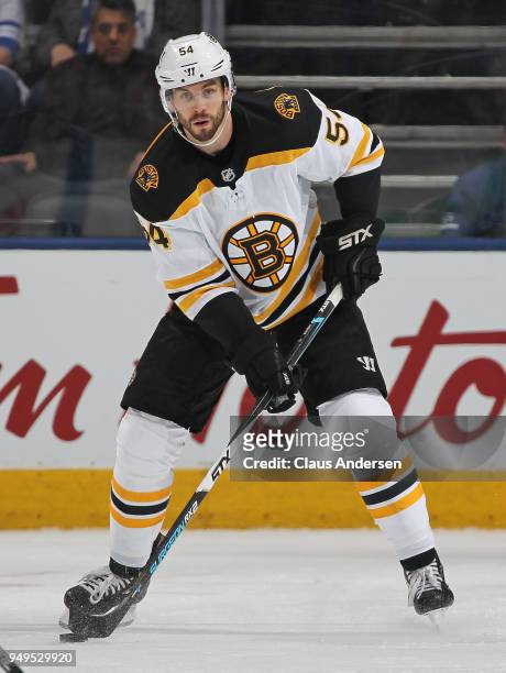 Adam McQuaid of the Boston Bruins skates with the puck against the Toronto Maple Leafs in Game Four of the Eastern Conference First Round in the 2018...