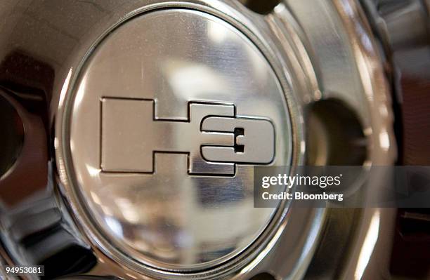 The Hummer H3 logo is seen on a hubcap at the Hummer of Manhattan dealership in New York, U.S., on Tuesday, June 2, 2009. General Motors Corp. Plans...