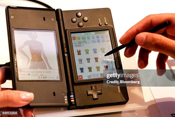 The Nintendo DSi is displayed at the Nintendo Co. Booth at the E3 Expo in Los Angeles, California, U.S., on Tuesday, June 2, 2009. Nintendo Co....