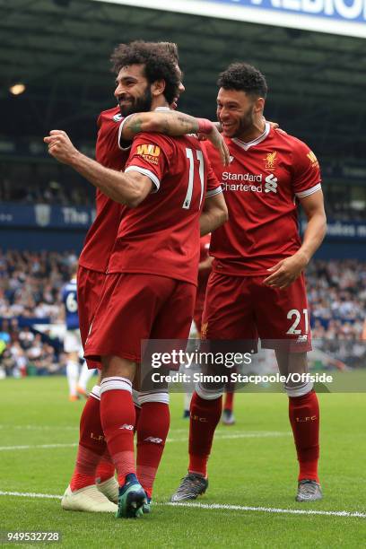 Mohamed Salah of Liverpool celebrates with teammate Alex Oxlade-Chamberlain of Liverpool after scoring their 2nd goal during the Premier League match...