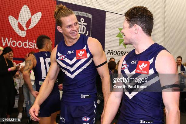 Nathan Fyfe of the Dockers shares a moment with Lachie Neale after winning the round five AFL match between the Fremantle Dockers and the Western...