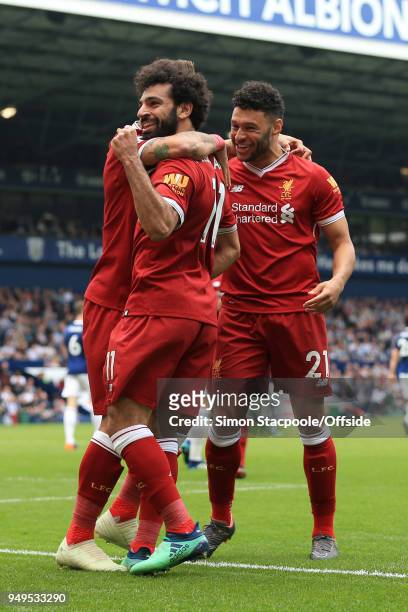 Mohamed Salah of Liverpool celebrates with teammate Alex Oxlade-Chamberlain of Liverpool after scoring their 2nd goal during the Premier League match...