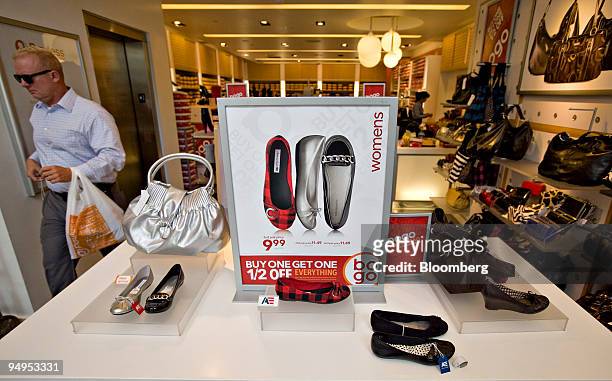 Shoes sit on display at a Payless ShoeSource store in New York, U.S., on Wednesday, Sept. 2, 2009. Collective Brands Inc., owner of Payless...