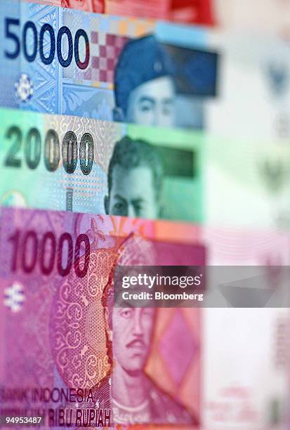 Indonesian rupiah banknotes are arranged for a photograph in Jakarta, Indonesia, on Thursday, Sept. 3, 2009. Indonesia's rupiah rose, snapping a...