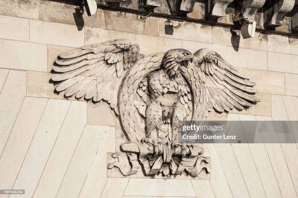 Heraldic animal eagle with a laurel wreath, relief on bridge, Pont Neuf, Paris, France